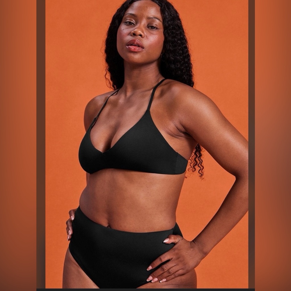 girlfriend collective swimsuits, two sets
